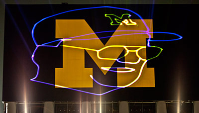 Bo Schembechler traced by lasers on the UM Stadium Scoreboard